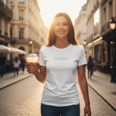 Women Crewneck T-shirt | Cavaliére in white with gold logo worn outdoors, casual city street style with natural sunlight glow